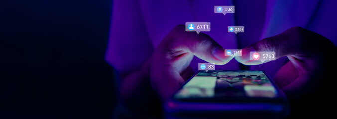 Obraz na płótnie Canvas business woman using smartphone ,icons social media fly over showing people engagement connection through social network application platform,Concept viral video and social media marketing
