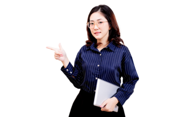 Asian young beautiful woman with glasses, wearing a blue striped shirt, holding a tablet and pointing with her right hand.