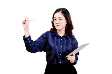 Asian young beautiful woman in glasses and a striped shirt holds a paper in one hand and writes or gestures with a pen in the other, appearing focused and engaged.