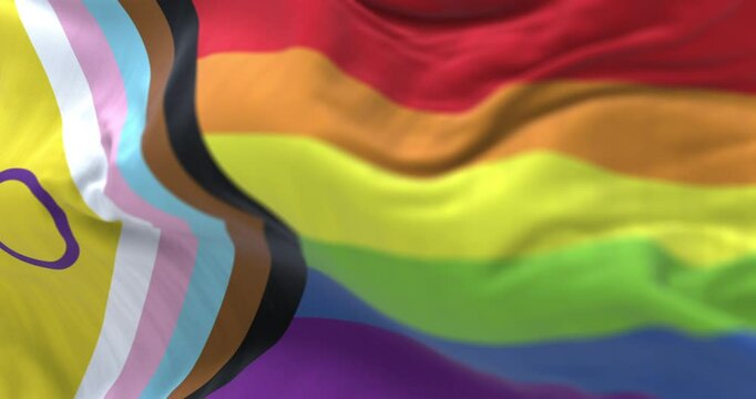 The Intersex-inclusive Progress Pride flag waving in the wind.