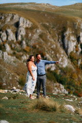 Romantic couple embracing outdoors in nature