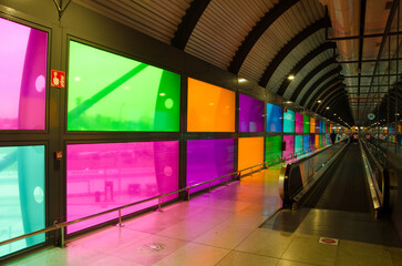 Aisle with stained glass windows. Adolfo Suarez Madrid-Barajas Airport. Madrid. Spain.