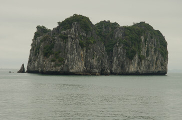 Limestone cliff in Lan Ha Bay. Cat Ba Archipelago. Vietnam.