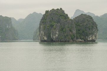 Limestone cliff in Lan Ha Bay. Cat Ba Archipelago. Vietnam.