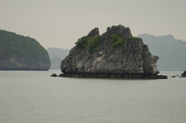 Limestone cliff in Lan Ha Bay. Cat Ba Archipelago. Vietnam.