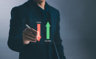 Quality increase and reducing cost Business strategy concept ,Businessman holding pen showing...