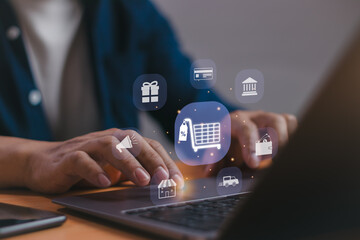 Online shopping service, ecommerce technology, payment, online marketing concept, man using computer with virtual shopping cart icon to order products on online marketing application or web page