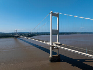 The old M48 Severn bridge from England to Wales.  Medium aerial shot