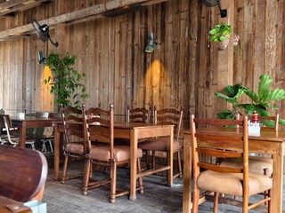 Wooden Café Interior with Natural rustic Decor and vintage furniture 