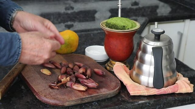 Traditional winter food and drink from the Gaucho culture, roasted pine nuts with chimarr&atilde;o