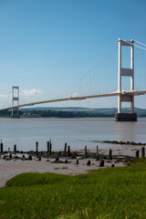Mid portrait view of the Old M48 Severn crossing with remains of the ferry pier in foreground