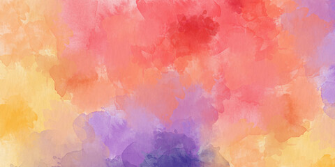 abstract watercolor background painting in yellow, orange, red and purple colors
