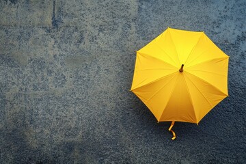 A single, bright yellow umbrella stands, A solitary yellow umbrella stands out