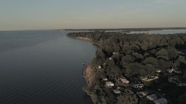 Drone over Lake Ontario looking east towards Sodus Point in summer
