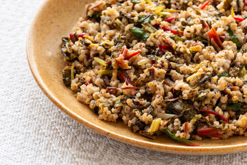 Barley groats with braised homegrown chard. 