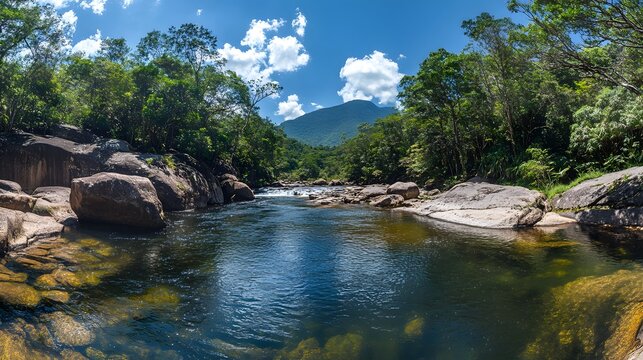 Panoramic landscape of the tropical river and dense forest canopy at Serra do Divisor, Brazil