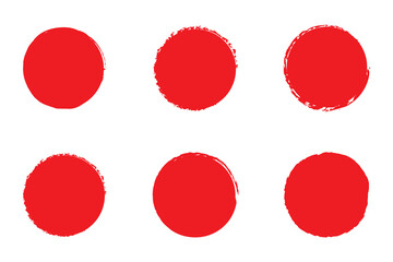 Set of red grunge circles. Stamp with jagged edges. Japanese sun isolated on white background.