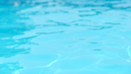 Fototapeta premium Calm, shimmering blue water creates a serene atmosphere, inviting relaxation and enjoyment in a tranquil setting