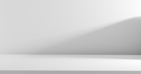 Minimalist empty white studio background with soft shadows, offering a pristine, clean space for product photography, advertising, modern design. Showcasing items with focus on simplicity and clarity.