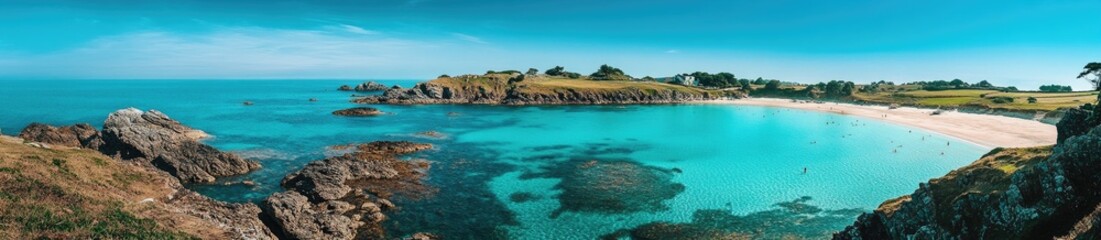 Panoramic view of a tranquil cove with turquoise water, a sandy beach, and rocky cliffs