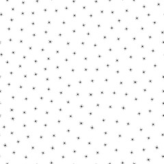 Ditsy Halloween seamless pattern with silhouette spiders. Vector hand drawn illustration. Tiny black arachnids on white background. October fall holidays backdrop for packaging, print. Creepy crawlies