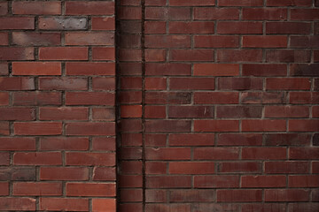 Old red brick wall. Grunge background
