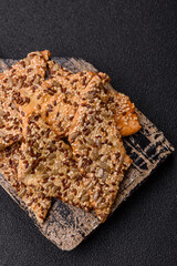 Crispbread, thin bread with seeds and grains, a baked cracker. Crispbread with sesame seeds