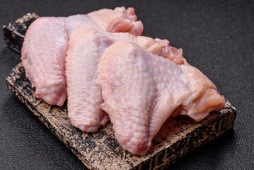 Raw chicken wings, fresh uncooked poultry meat. Chicken or turkey wings