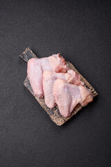 Raw chicken wings, fresh uncooked poultry meat. Chicken or turkey wings