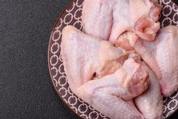 Raw chicken wings, fresh uncooked poultry meat. Chicken or turkey wings