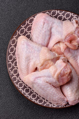 Raw chicken wings, fresh uncooked poultry meat. Chicken or turkey wings