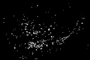 Broken styrofoam chunks and crushed pieces pile isolated on black background with clipping path, top view