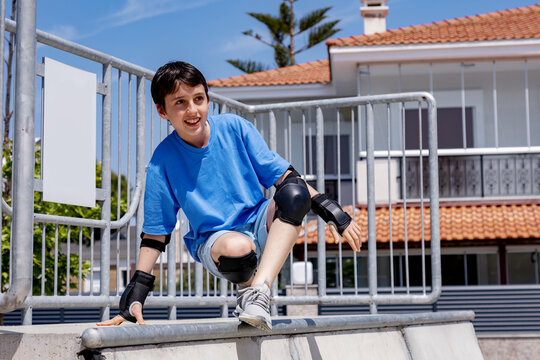 Boy enjoying outdoor sports with safety gear