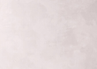 Subtle Texture of a Pale, Smooth Concrete Wall