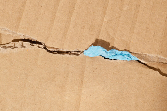 Fixing a broken cardboard surface with blu tack