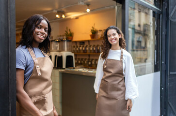 Friendly clerks at an organic bulk store entrance