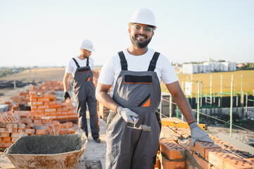 Group of indian workers at a construction site