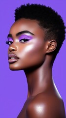 Vibrant beauty portrait with stunning purple makeup on bold background