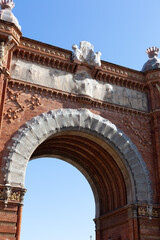 Arc de triomf showing intricate brickwork and sculptures in barcelona, spain