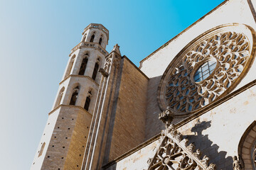 Santa maria del Mar church showing rose window and bell tower in barcelona, spain