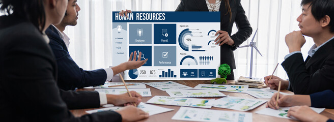 Human resources management software on computer screen helping human resources employee to manage...