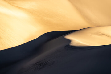 Golden sand dunes and their mesmerizing textures