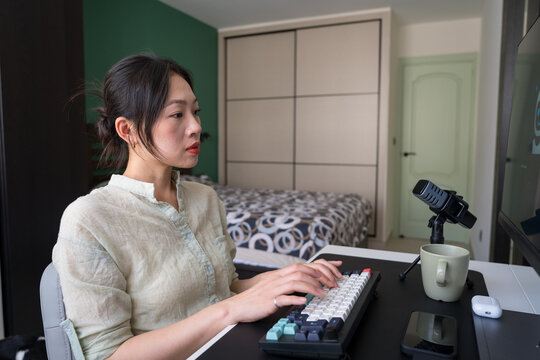 Young Professional Enhances Productivity with Robot Assistant