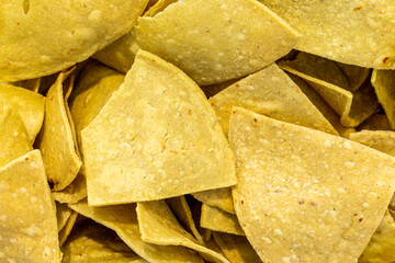 Close-up texture of crispy Nopal tortilla chips background