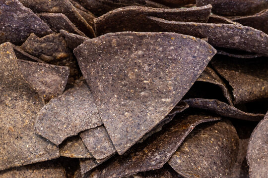 Blue corn tortilla chips rich texture in close-up
