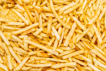 Crisp golden french fries texture in close-up