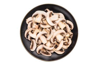 Sliced champignons Mushrooms in a plate isolated on white background.