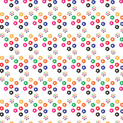 Colorful floral pattern with repeating flowers and small dots on a white background