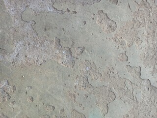Distressed Concrete Floor Surface with Pitting and Cracks