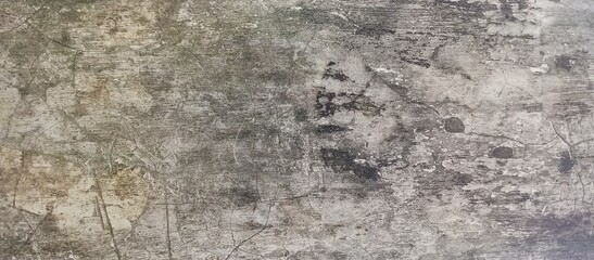 Heavily Distressed Grey Concrete Wall with Cracks